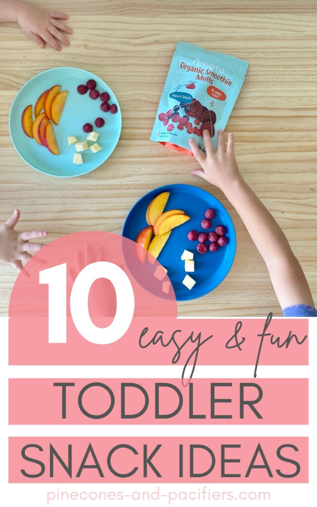 Toddler reaching for snacks on plates (toddler snack ideas)