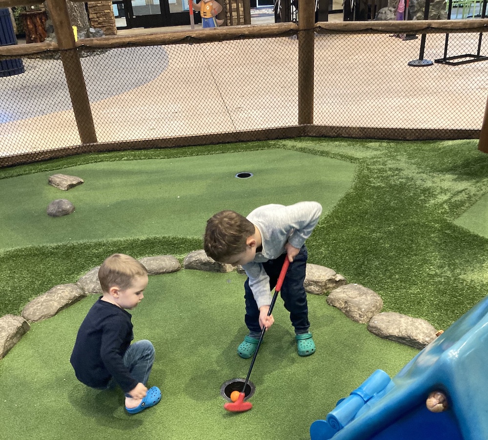 Boys playing Mini Golf at Great Wolf Lodge
