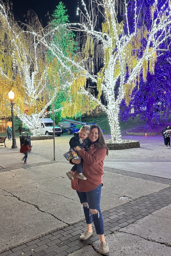 Mom and toddler with Christmas lights