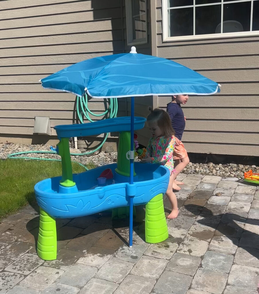 water table with small umbrella